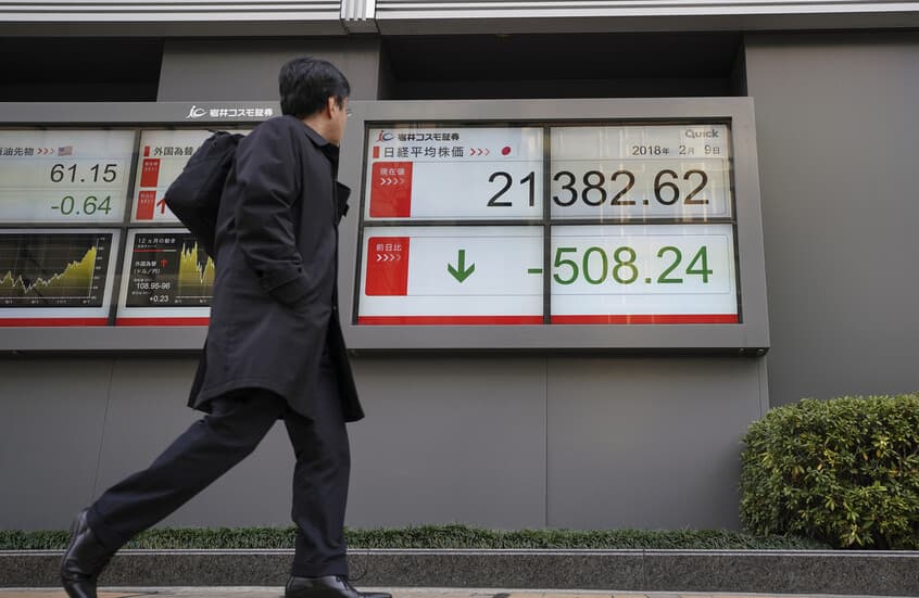 Las acciones asiáticas suben impulsadas por las ganancias de Wall Street y acuerdos tecnológicos