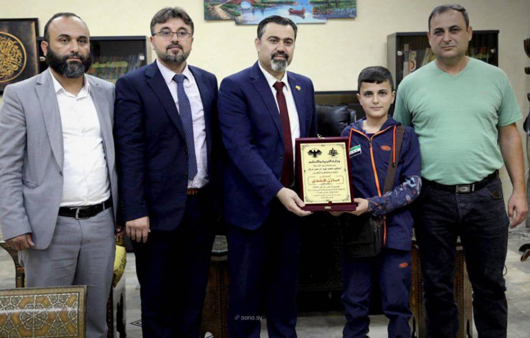 The Syrian Minister of Education Honors Student Mazen Fandi for Achieving Third Place in the World Chess Championship